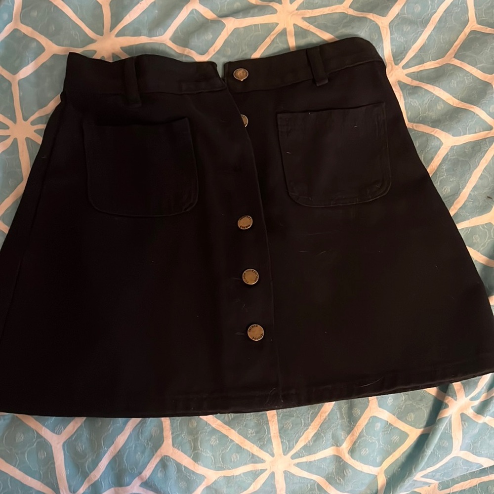 Small black denim skirt